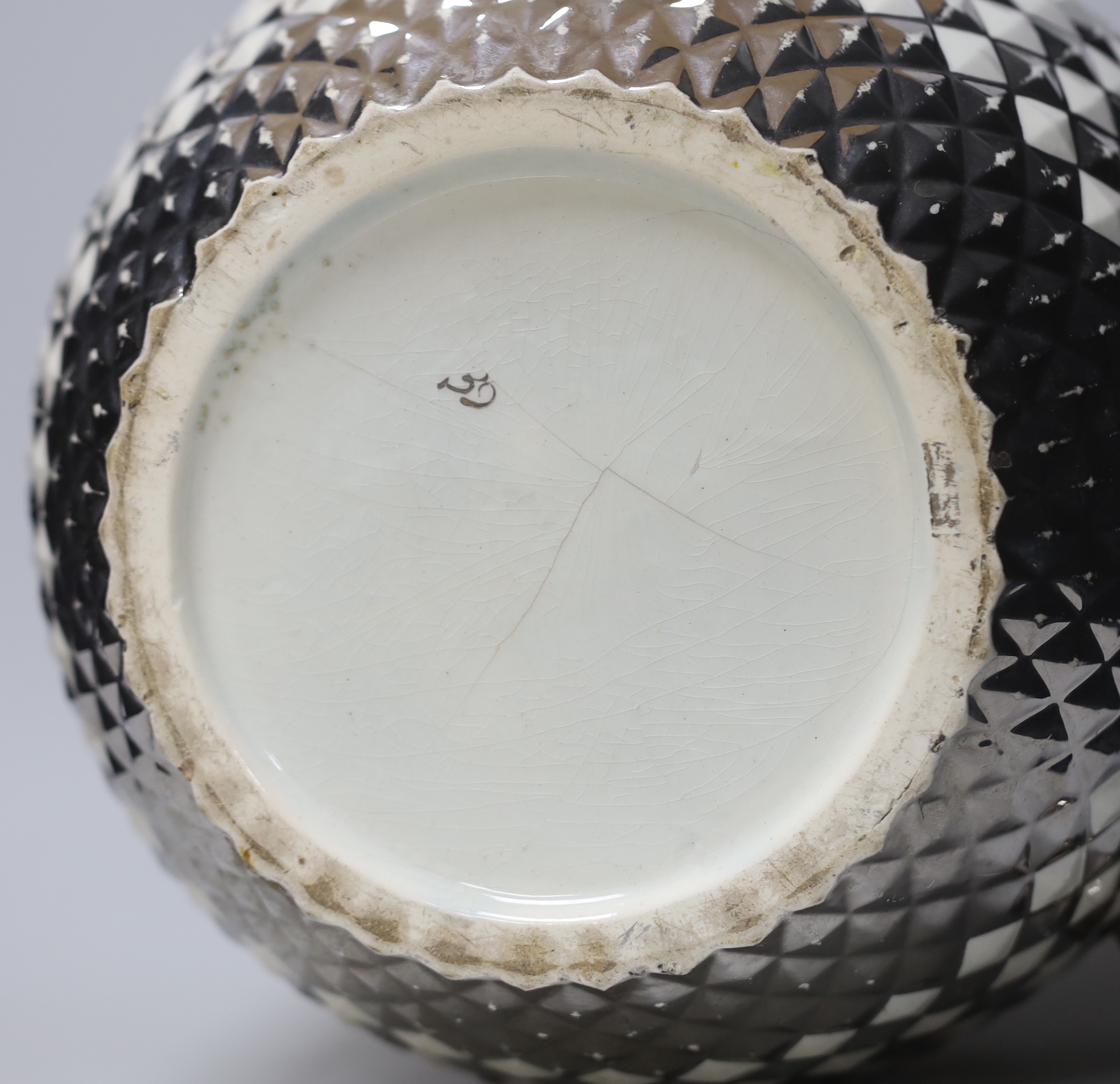 A massive early 19th century Staffordshire pineapple moulded silver lustre large jug, 33cm